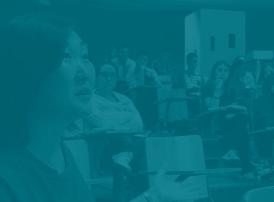 people sit attentive in classroom